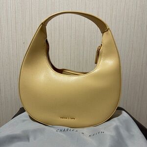 [Charles & Keith] beige/ butter yellow crescent shoulder bag